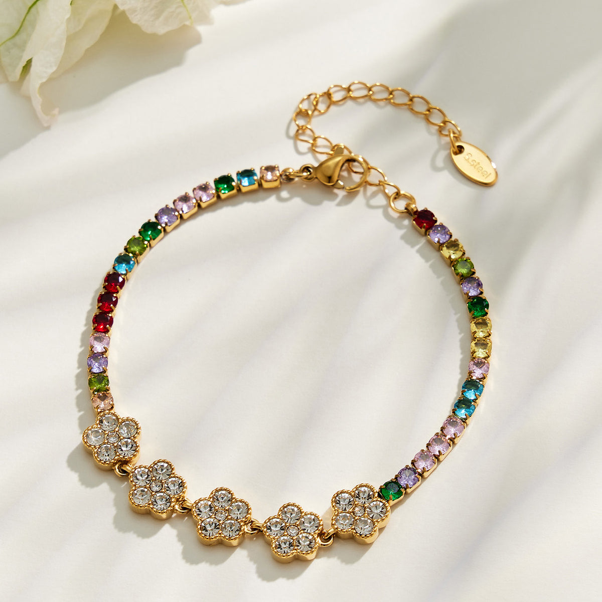 Multicolor zircon motif bracelet flat lay