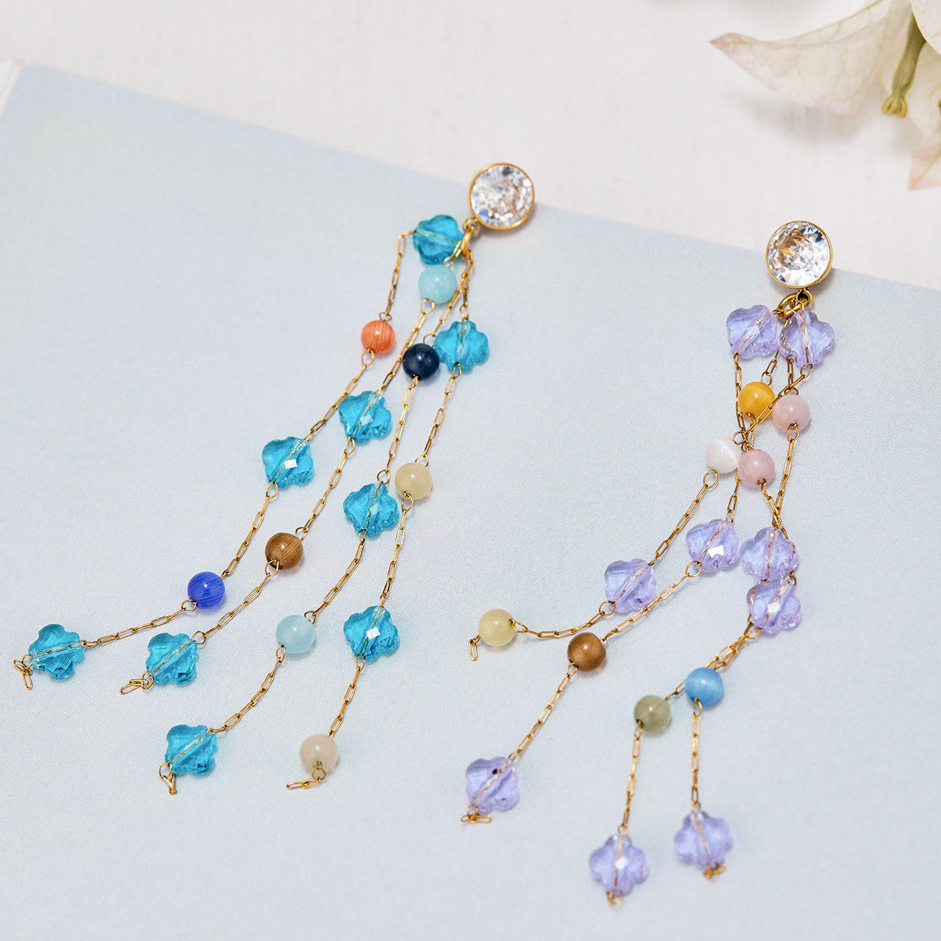 Side view of natural stone long drop earrings showing hanging design