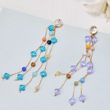 Side view of natural stone long drop earrings showing hanging design