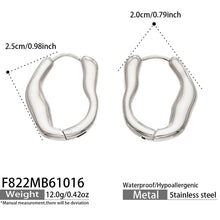 Product dimension diagram of silver sculptural hoop earrings showing the curved hoop shape and measurements