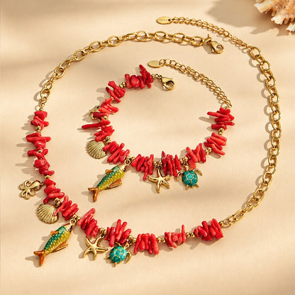 Ocean animal charm necklace and bracelet product view with turtle, shell, starfish and coral details in 316L stainless steel