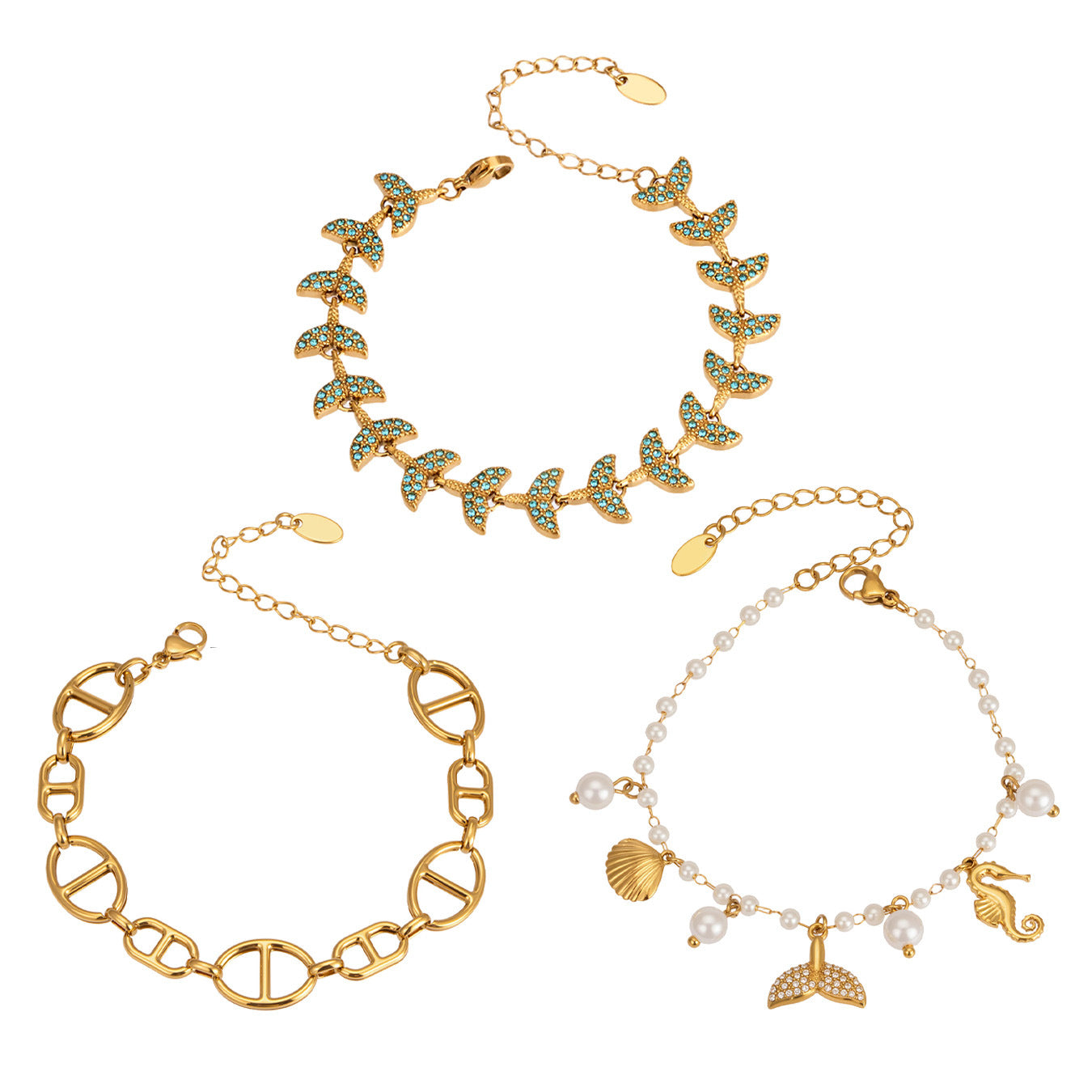 Ocean charm bracelet collection with fish tail, shell, faux pearl and marine-inspired designs for wholesale boutique buyers