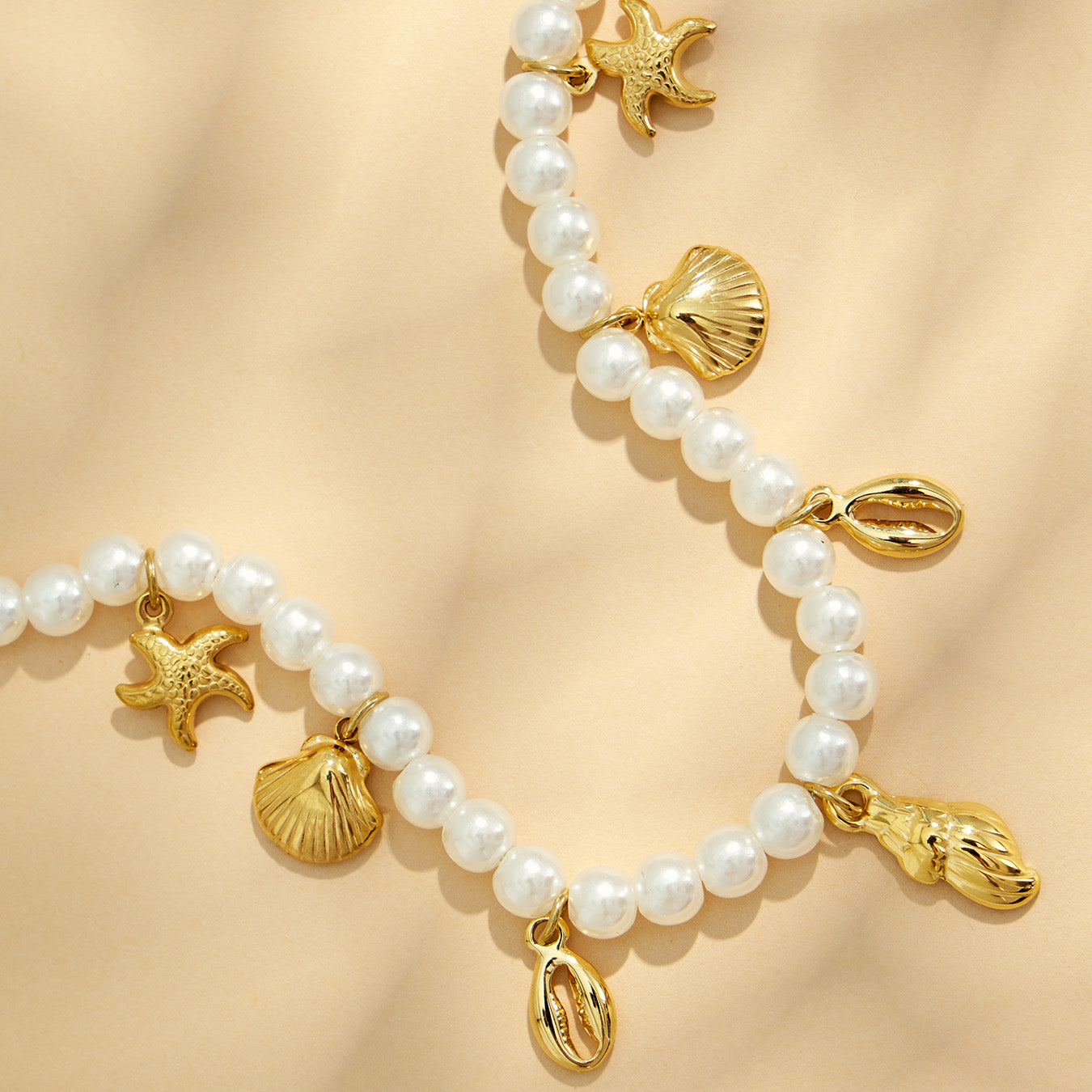 316L Stainless Steel 18K PVD Gold Ocean Shell Y-Shaped Necklace made with 316L stainless steel and 18K PVD gold finish for wholesale jewelry buyers - image 14