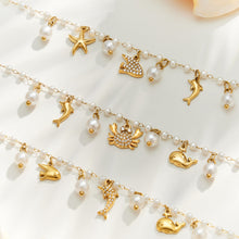 Gold ocean charm pearl bracelet collection showing three marine-inspired stainless steel designs