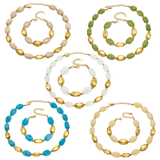 Organic resin necklace and bracelet set in white green blue and neutral colors with sculptural metal accents