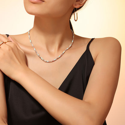 Colorful natural stone heishi bead necklace worn by model for vacation, resort and boutique necklace styling