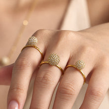 Gold pavé zircon ball open rings styled together on model hand