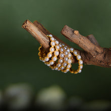 Close-up view of 18K PVD gold pearl bead ring