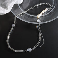 Pearl CZ chain hoop earrings styled for evening jewelry and boutique statement earring assortments
