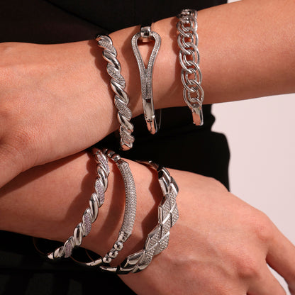 Model stacking polished silver stainless steel zircon bangles, European minimalist fashion