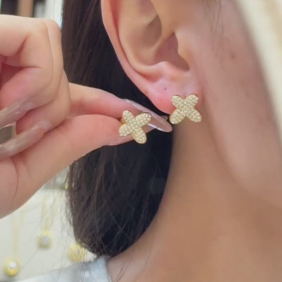 Video showing 316L stainless steel A-Z initial letter stud earrings in 18K PVD gold for personalized boutique jewelry