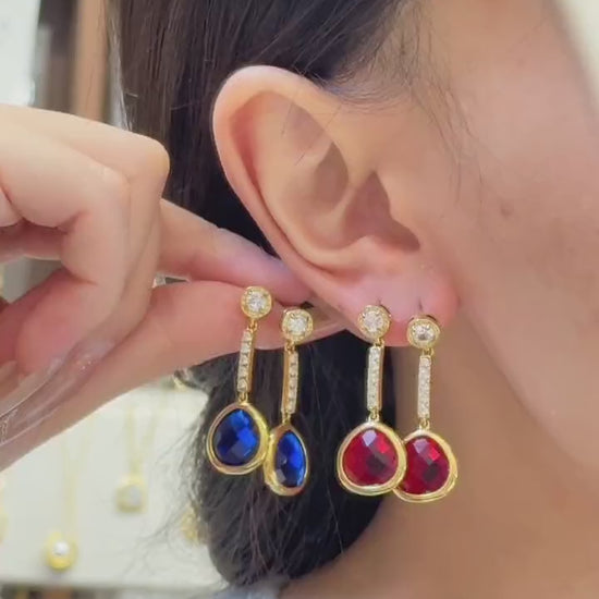 Short jewelry video featuring layered gold butterfly and flower charm necklace & bracelet set worn by a female model, 316L stainless steel PVD gold women jewelry