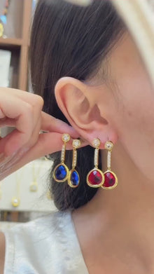 Short jewelry video featuring layered gold butterfly and flower charm necklace & bracelet set worn by a female model, 316L stainless steel PVD gold women jewelry