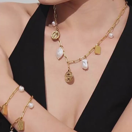 Video cover showing model wearing gold paperclip link DIY charm necklace and bracelet set in 316L stainless steel layered fashion jewelry by Miduoduo Jewelry