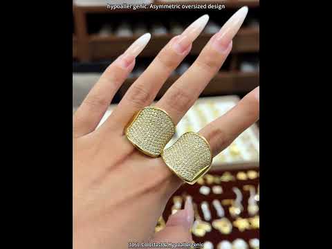 Video showing 18K PVD gold CZ wide band statement ring made from 316L stainless steel for wholesale jewelry buyers