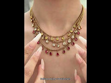 Rainbow crystal teardrop necklace video showing colorful CZ charms on waterproof gold stainless steel chain
