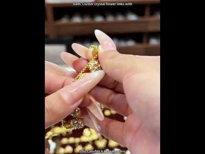 Video showing E161 adjustable CZ flower bracelet made with 316L stainless steel and 18K PVD gold finish for wholesale jewelry buyers