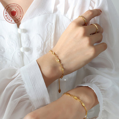 316L Stainless Steel Minimalist Tennis Racket Charm Bracelet - Image 1