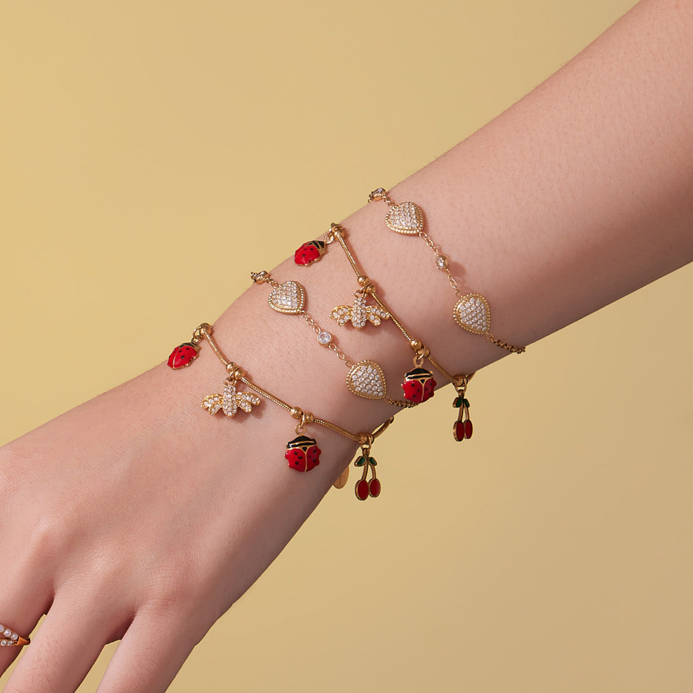 Model wearing waterproof zircon waterdrop charm bracelet, 316L stainless steel jewelry