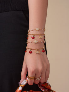 Flatlay of waterproof zircon waterdrop charm bracelets, 316L stainless steel wholesale