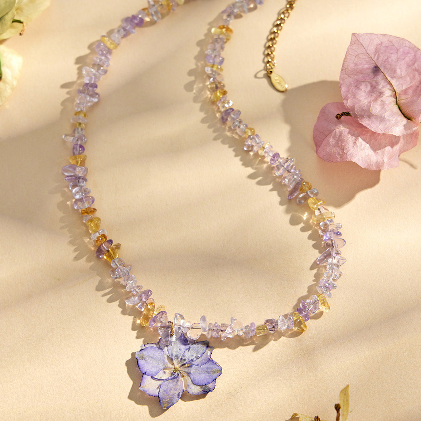 Purple crystal bead necklace with pink resin flower pendant for wholesale boutique floral jewelry collections