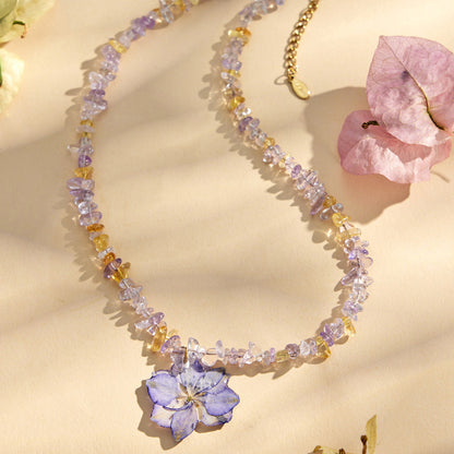 Purple crystal bead necklace with pink resin flower pendant for wholesale boutique floral jewelry collections