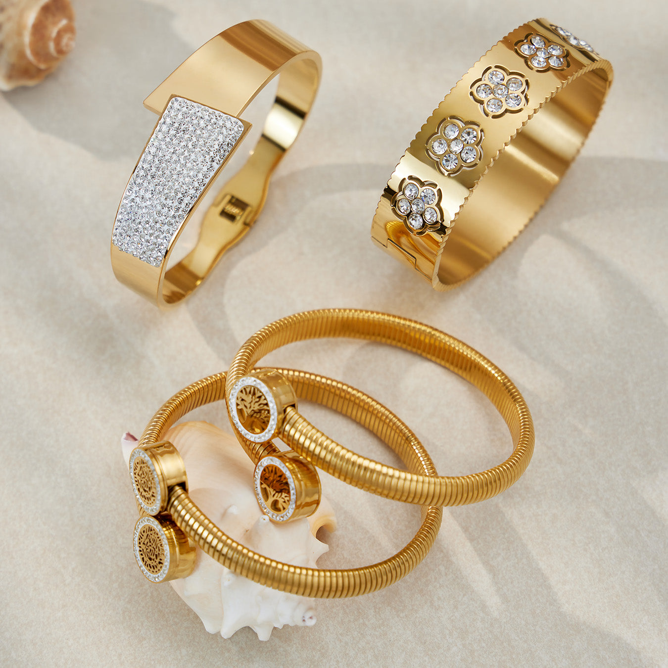 PVD gold plated zircon flower open bangle set displayed on neutral background