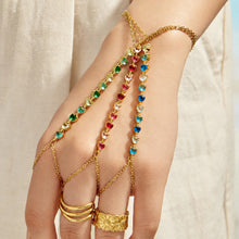 Red cubic zirconia hand chain bracelet with 18K PVD gold finish