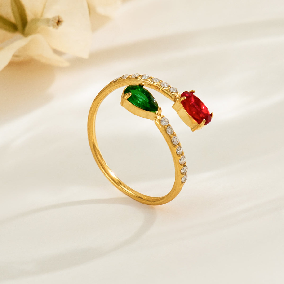 Gold stainless steel open rings with red and green colored glass and white cubic zirconia accents