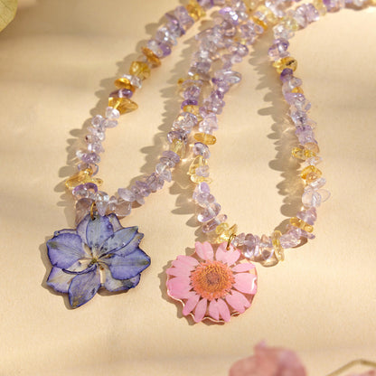 Pressed flower style crystal necklaces with resin floral pendants for gift shops and boutique jewelry assortments