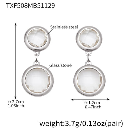 Silver tone round bezel glass stone drop earrings with clear stones showing size and weight reference