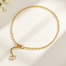 Short gold zircon toggle necklace with geometric drop pendant and link chain