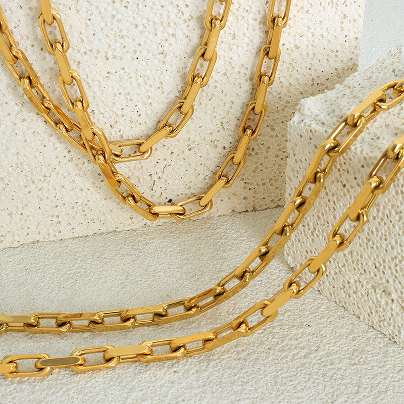 Silver stainless steel chunky chain bracelet isolated on a white background
