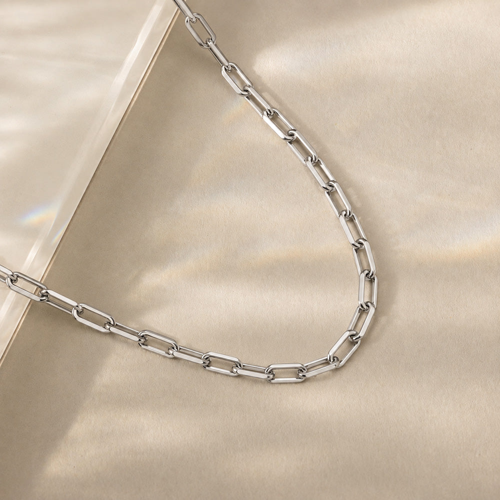 Silver stainless steel chunky chain necklace isolated on a white background