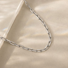 Silver stainless steel chunky chain necklace isolated on a white background