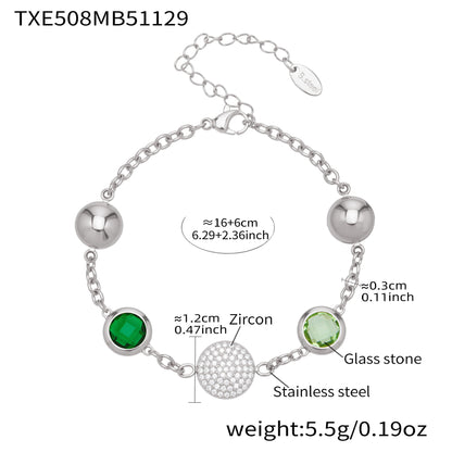 Silver stainless steel bracelet with green glass stones and round zircon charm