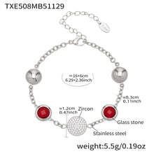 Colorful glass stone bracelets in 18K gold bezel settings, demonstrating tarnish-resistant jewelry quality.