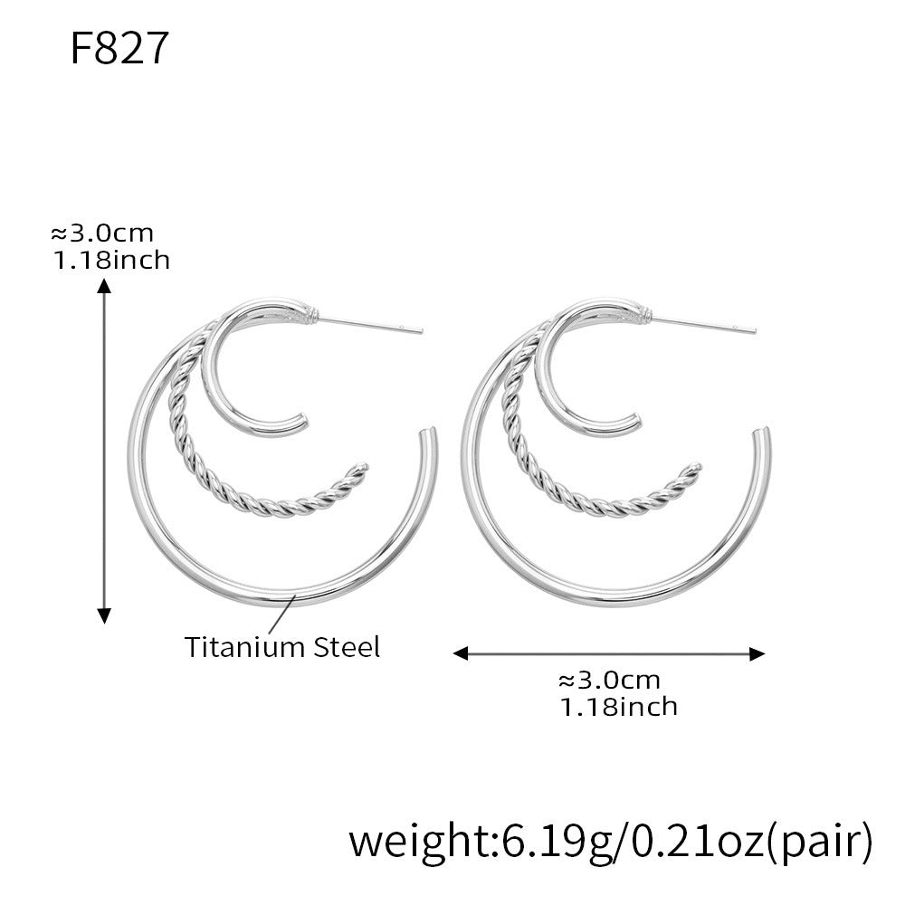 Size specifications for silver stainless steel triple layer hoop earrings.