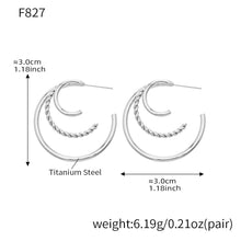 Size specifications for silver stainless steel triple layer hoop earrings.