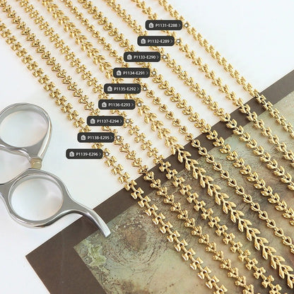 Stackable gold chain bracelets flat lay with multiple geometric link styles for wholesale jewelry displays