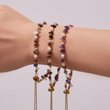 Stacked natural stone bracelets with pearl accents and adjustable extender chains