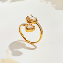 Side view of the A459 gold-tone double-heart halo ring showing raised heart-shaped stones