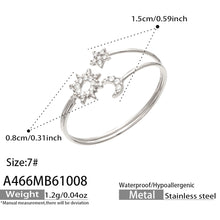 A466 steel-tone celestial ring specification diagram showing size 7, decorative measurements and approximate weight 1.2 g