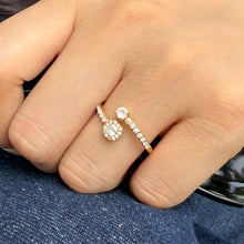 A624 gold-tone square halo open ring worn on a finger against denim