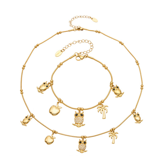 Stainless steel animal charm necklace and bracelet collection with gold-tone owl, apple and palm tree details