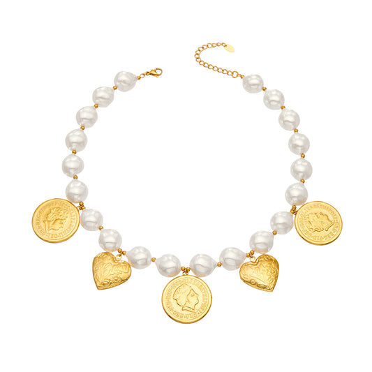 Stainless steel beaded heart charm necklace with ivory-tone beads and gold medallion details