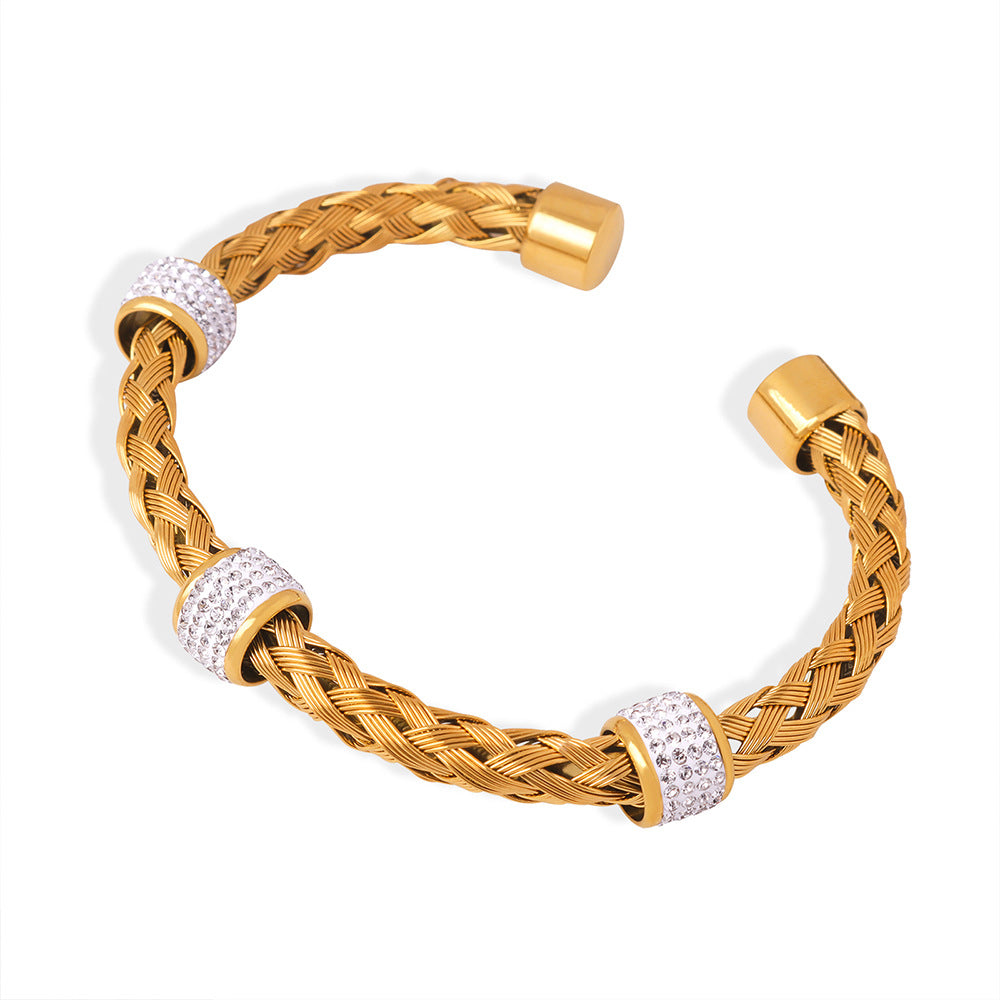 Braided stainless steel open bangle with CZ spacer accents and 18K PVD gold finish