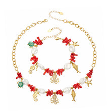 Stainless steel ocean animal charm necklace and bracelet with red coral-style bead accents