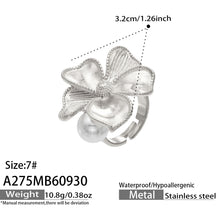 Dimension diagram of the A275 silver-tone stainless steel sculpted flower ring with a faux pearl accent, showing a 3.2 cm flower width