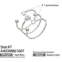 A403 steel-tone heart and bead ring specification diagram showing size 7, a 1.6 cm measurement and approximate weight 1.9 g